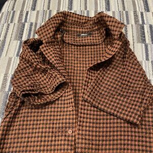 Gently worn. Original tags.